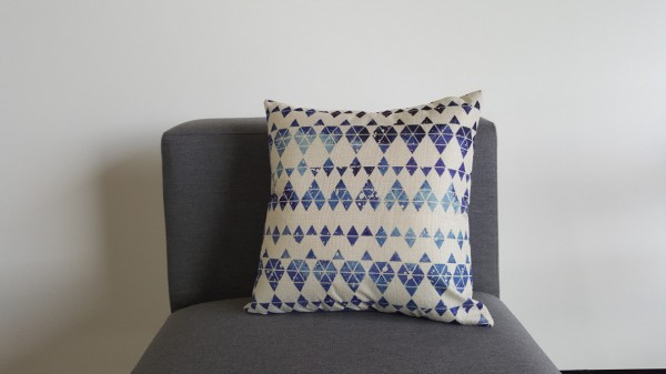 Decorative pillow in mosaic blue